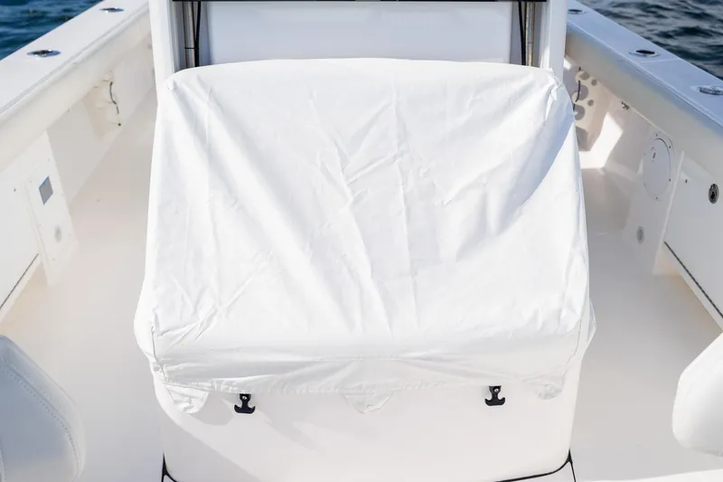  Yacht Photos Pics White covered seat on 2021 Everglades 273 Center Console boat.