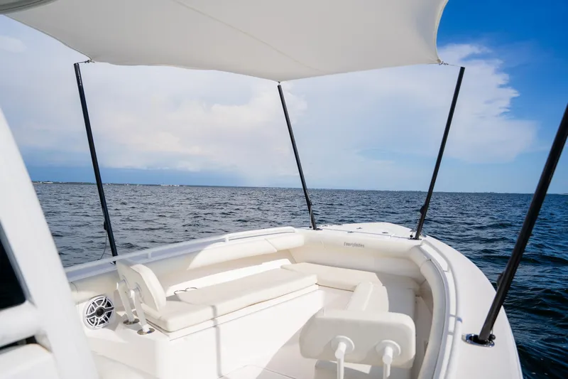  Yacht Photos Pics 2021 Everglades 273 Center Console boat on open water under clear sky.