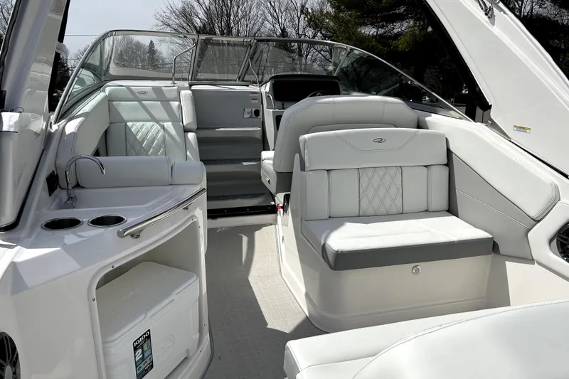  Yacht Photos Pics 2023 Regal 28 Express boat interior with luxurious seating and modern amenities.