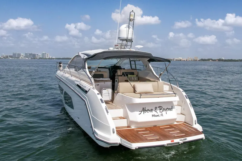 Above & Beyond Yacht Photos Pics Azimut 43 ATLANTIS 2016 yacht cruising in Miami waters, rear view.