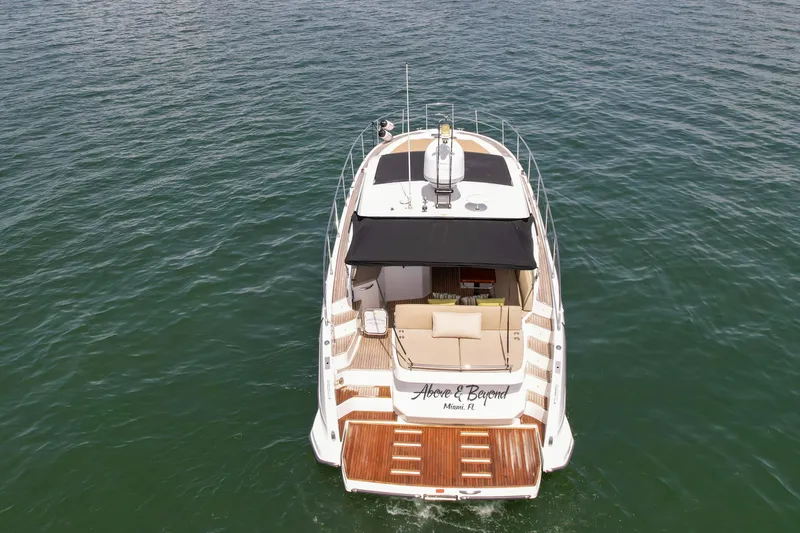 Above & Beyond Yacht Photos Pics Azimut 43 ATLANTIS 2016 yacht on open water, rear view.