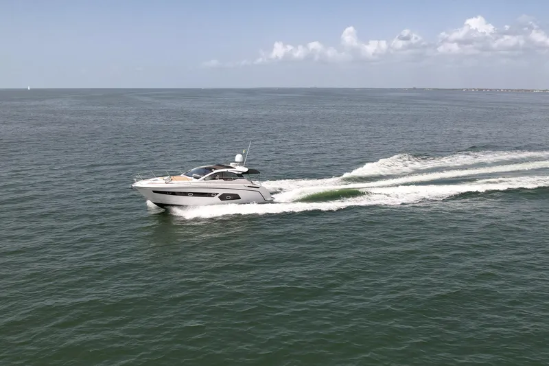 Above & Beyond Yacht Photos Pics 2016 Azimut 43 ATLANTIS yacht cruising on open water.