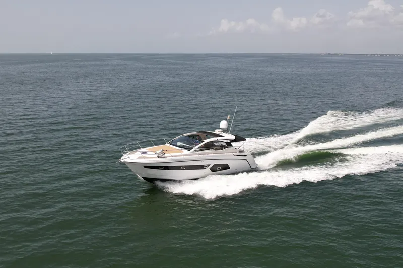 Above & Beyond Yacht Photos Pics Azimut 43 ATLANTIS 2016 yacht cruising on open water.