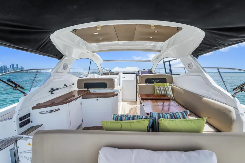 Above & Beyond Yacht Photos Pics Luxurious 2016 Azimut 43 ATLANTIS yacht interior with modern seating and ocean view.