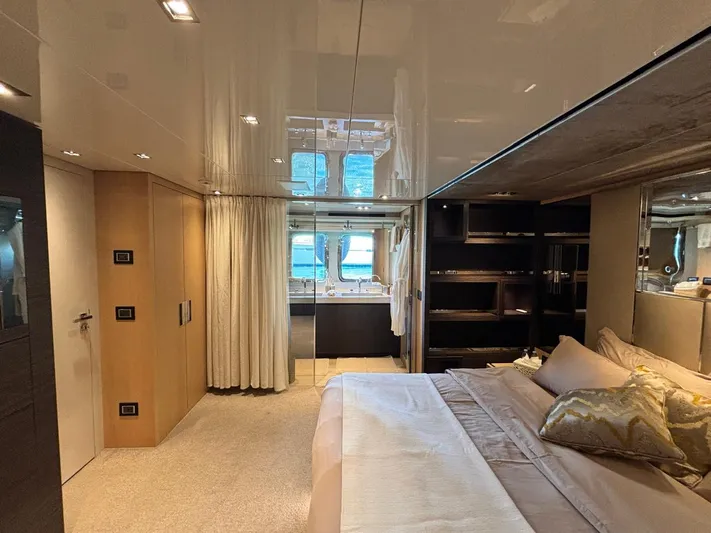 Lady Ab Yacht Photos Pics Luxurious bedroom interior of 2013 Sanlorenzo SL94 yacht with elegant furnishings and ocean view.