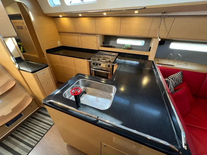 Xaca Yacht Photos Pics Luxurious 2015 X-Yachts Xp 55 yacht interior with modern kitchen and sleek design.