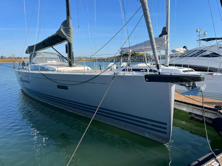 Xaca Yacht Photos Pics 2015 X-Yachts Xp 55 sailboat docked in marina, clear blue sky.