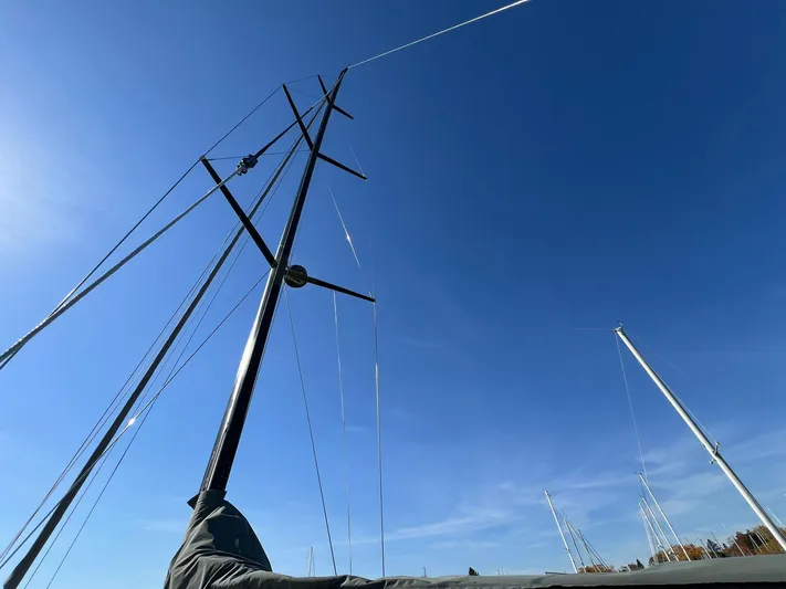 Xaca Yacht Photos Pics 2015 X-Yachts Xp 55 sailboat mast against clear blue sky.