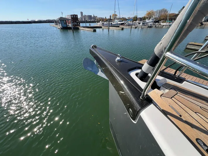 Xaca Yacht Photos Pics Xp 55 yacht by X-Yachts, 2015 model, docked in a serene marina setting.