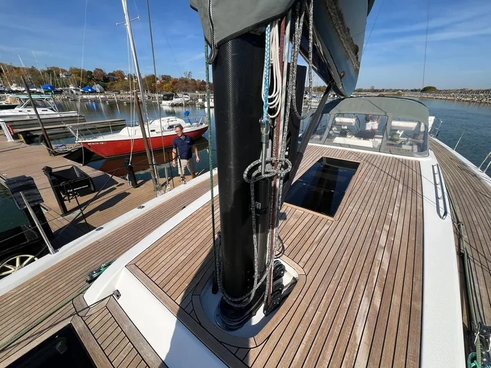 Xaca Yacht Photos Pics Xp 55 sailboat deck with mast, docked at marina, clear sky, 2015 X-Yachts model.