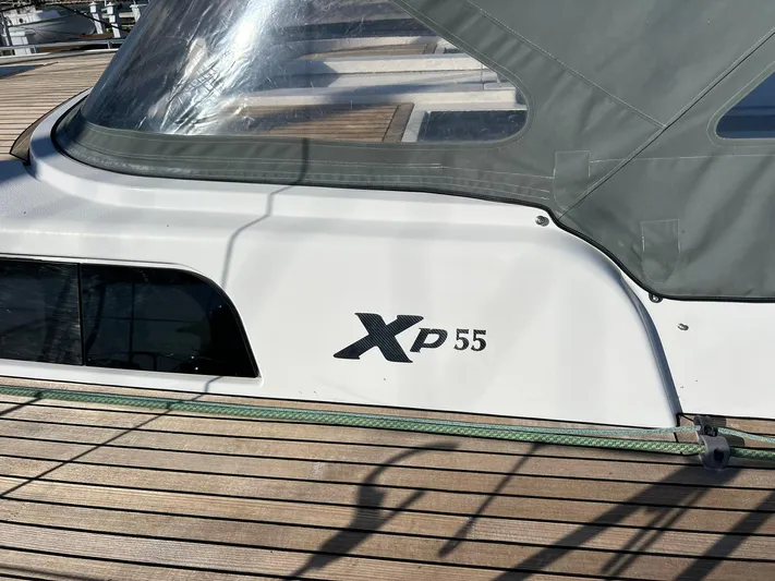 Xaca Yacht Photos Pics 2015 X-Yachts Xp 55 sailboat with sleek design and wooden deck.