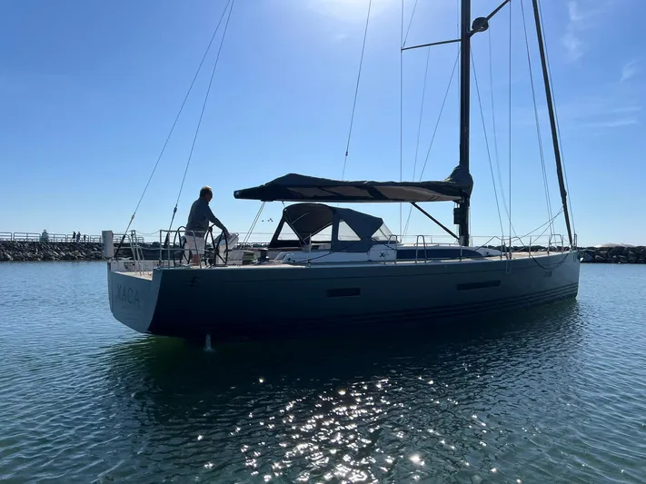 Xaca Yacht Photos Pics 2015 X-Yachts Xp 55 sailing in calm waters under clear blue sky.