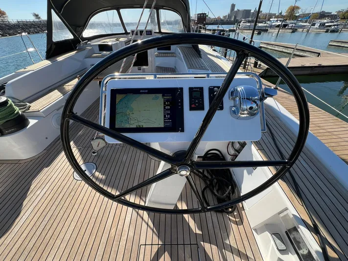 Xaca Yacht Photos Pics Steering wheel and navigation system on 2015 X-Yachts Xp 55 sailboat deck.