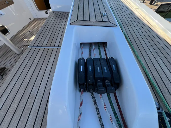 Xaca Yacht Photos Pics Deck of 2015 X-Yachts Xp 55 sailboat with rope clutches and teak flooring.