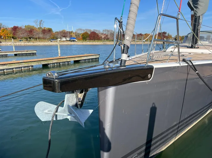 Xaca Yacht Photos Pics 2015 X-Yachts Xp 55 sailboat docked, featuring sleek bow design and anchor.