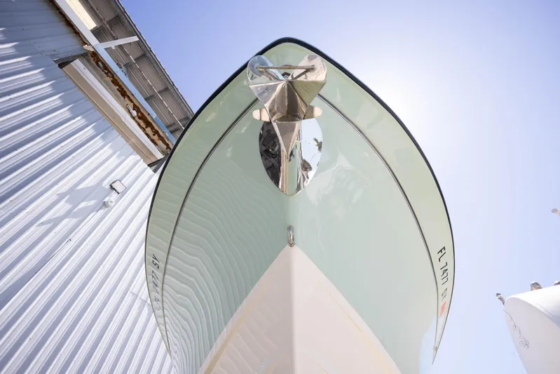  Yacht Photos Pics 2021 Grady-White Freedom 275 boat, viewed from below, showcasing sleek hull design.