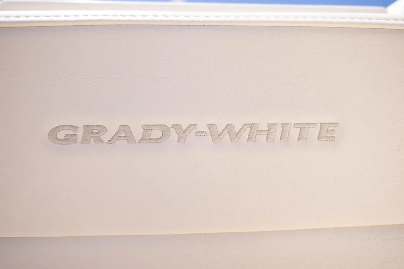  Yacht Photos Pics Grady-White logo on 2021 Freedom 275 boat seat, close-up view.