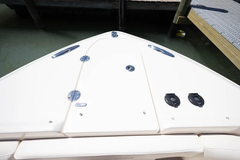  Yacht Photos Pics Bow of 2021 Grady-White Freedom 275 boat docked at marina.