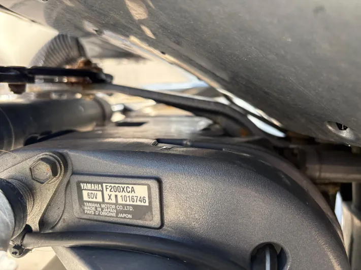  Yacht Photos Pics Close-up of a Yamaha F200XCA engine on a 2021 Grady-White Freedom 275 boat.