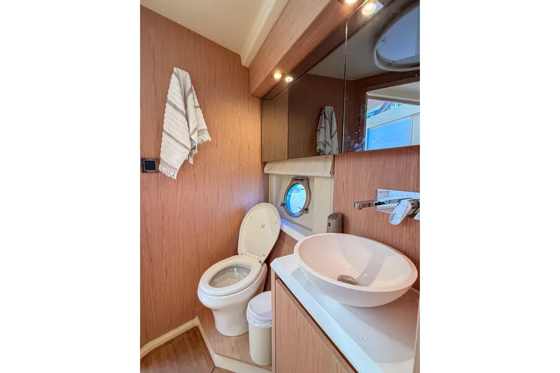  Yacht Photos Pics Luxurious bathroom in 2018 Beneteau Monte Carlo 5 yacht with modern fixtures.