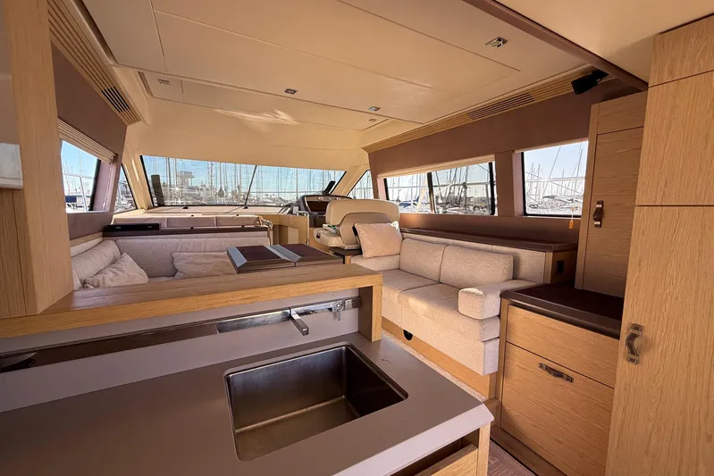  Yacht Photos Pics Luxurious interior of 2018 Beneteau Monte Carlo 5 yacht with modern furnishings.