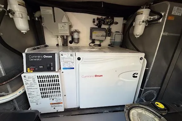  Yacht Photos Pics Cummins Onan generator in 2018 Beneteau Monte Carlo 5 engine room.