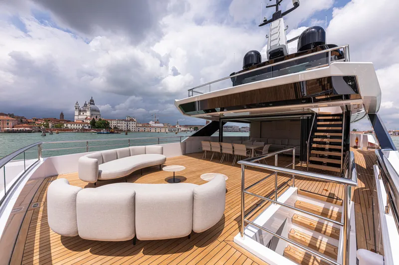 Ducale 120 Yacht Photos Pics Luxurious Ocean King Ducale 120 yacht deck with modern seating, overlooking scenic waterfront, 2027 model.