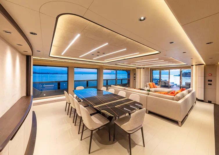 Ducale 120 Yacht Photos Pics Luxurious interior of 2027 Ocean King Ducale 120 yacht with elegant dining and lounge area.