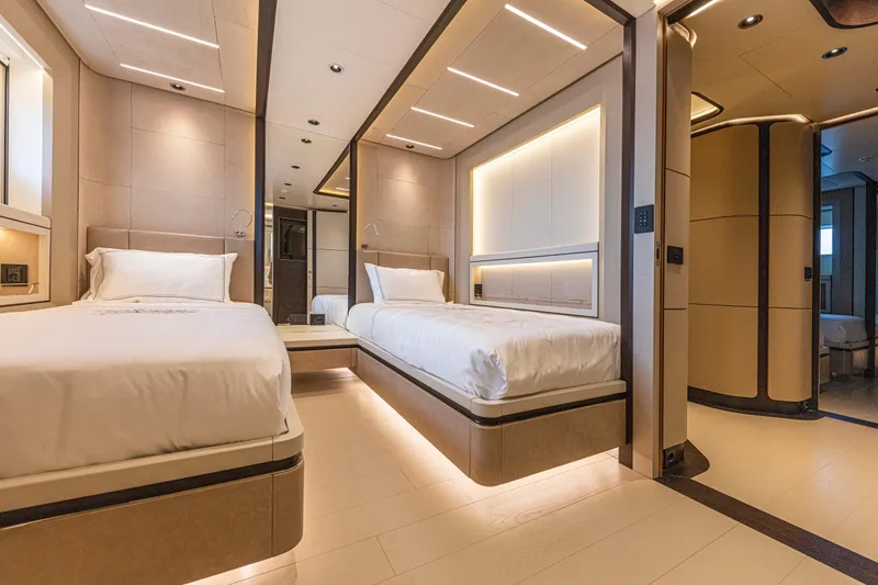 Ducale 120 Yacht Photos Pics Luxurious Ocean King Ducale 120 yacht bedroom with modern twin beds, elegant lighting, and sleek design.