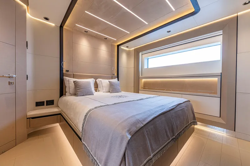 Ducale 120 Yacht Photos Pics Luxurious bedroom interior on Ocean King Ducale 120 yacht, 2027 model, featuring modern design and ambient lighting.