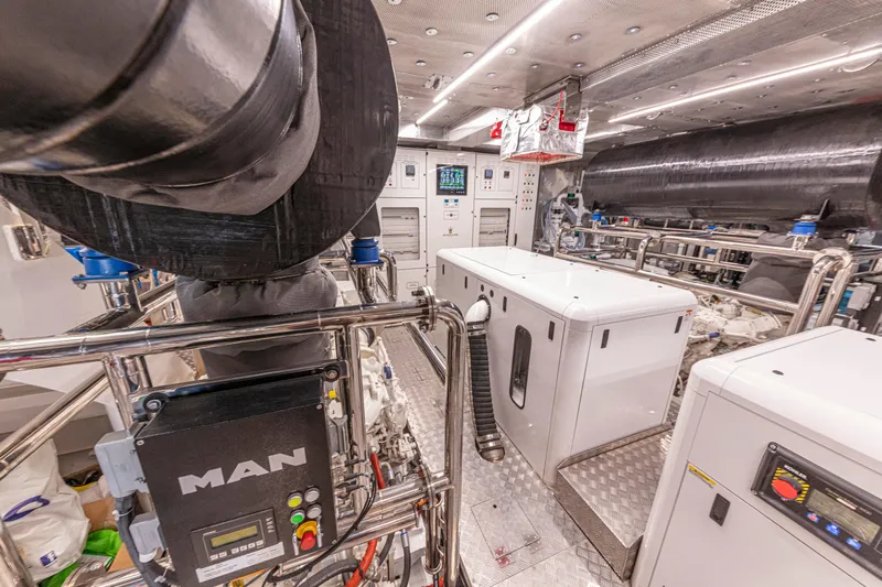 Ducale 120 Yacht Photos Pics Engine room of Ocean King Ducale 120 yacht, featuring advanced machinery and control systems, 2027 model.