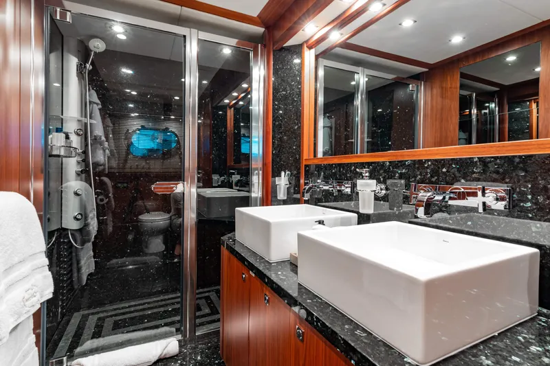 Mercy Yacht Photos Pics Luxurious bathroom on 2009 Sunseeker 121 yacht with modern fixtures and elegant design.