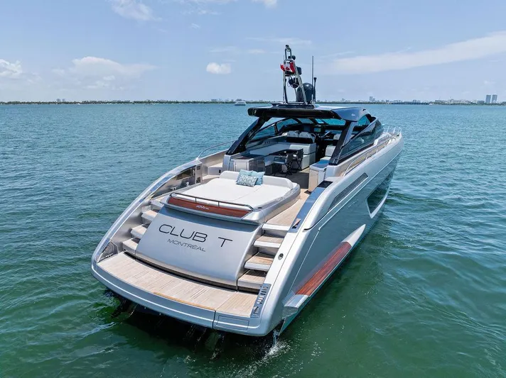 Club T Yacht Photos Pics 2023 Riva 68 Diable luxury yacht cruising on open water.