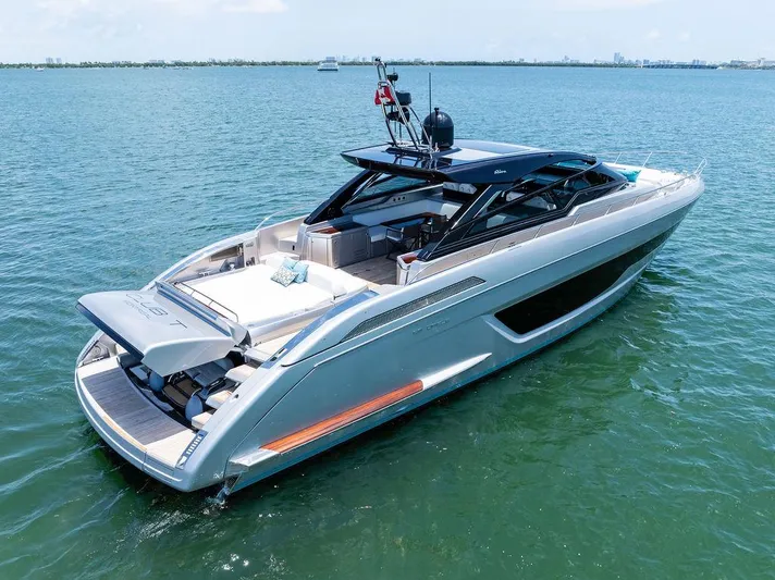 Club T Yacht Photos Pics 2023 Riva 68 Diable luxury yacht on calm blue water.