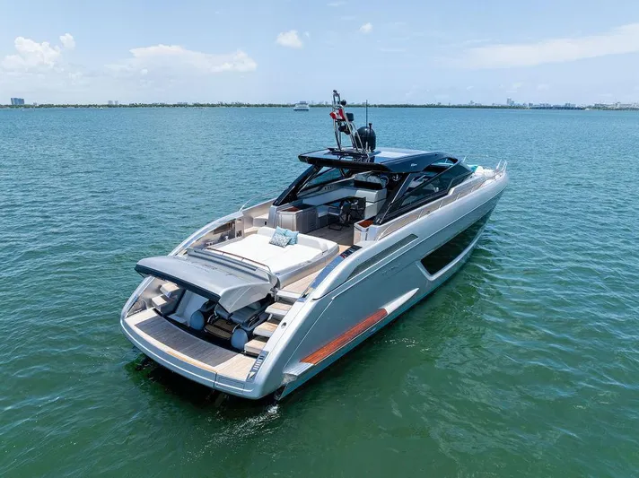 Club T Yacht Photos Pics 2023 Riva 68 Diable luxury yacht on calm blue water.