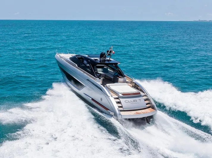 Club T Yacht Photos Pics 2023 Riva 68 Diable yacht cruising on open blue sea.