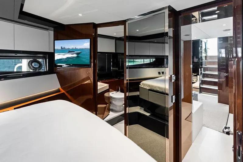 Club T Yacht Photos Pics Luxurious interior of 2023 Riva 68 Diable yacht with modern design and amenities.