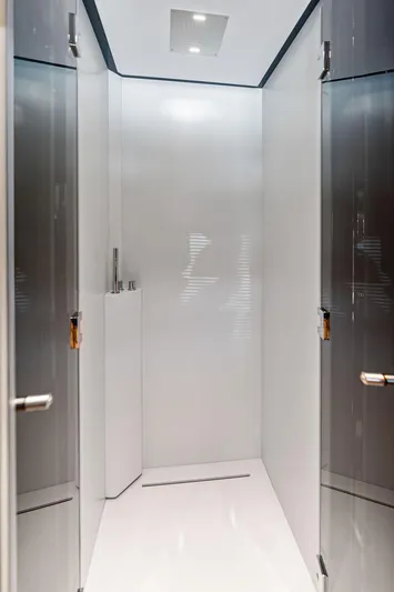 Club T Yacht Photos Pics Interior of 2023 Riva 68 Diable yacht, featuring sleek modern design and glossy finishes.