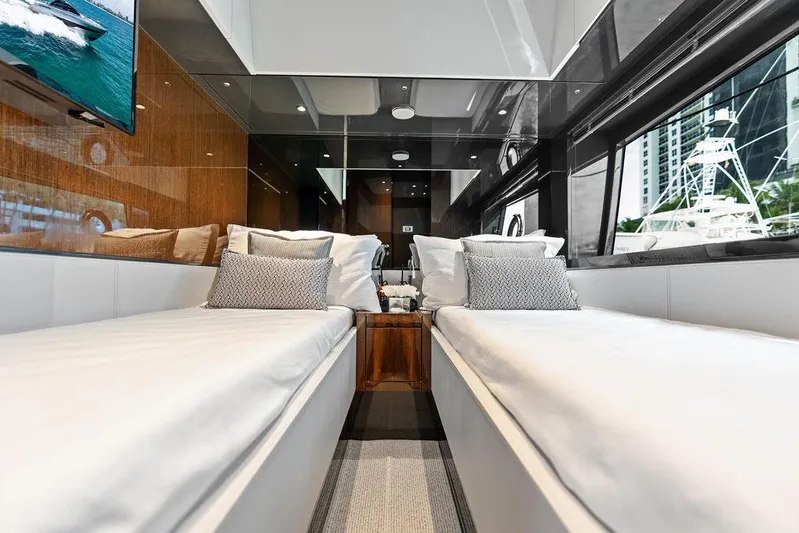 Club T Yacht Photos Pics Luxurious interior of 2023 Riva 68 Diable yacht with twin beds and modern design.