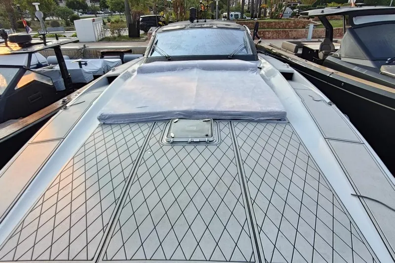  Yacht Photos Pics Otam 55 Millenium 1998 yacht with sleek deck design and modern features.