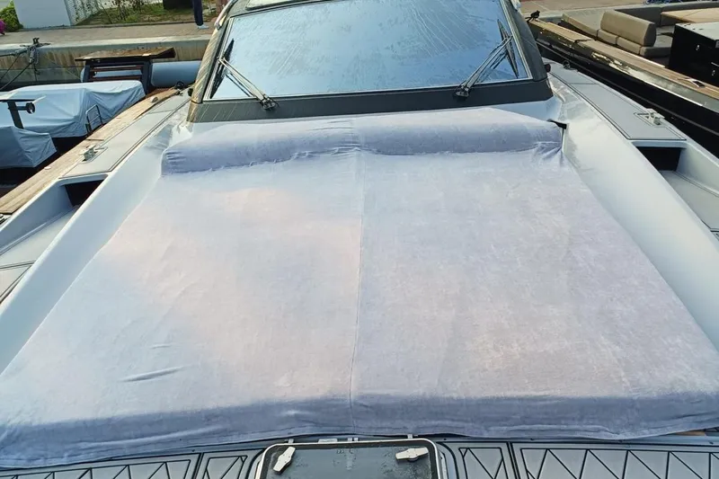  Yacht Photos Pics 1998 Otam 55 Millenium yacht with covered deck, docked at marina.