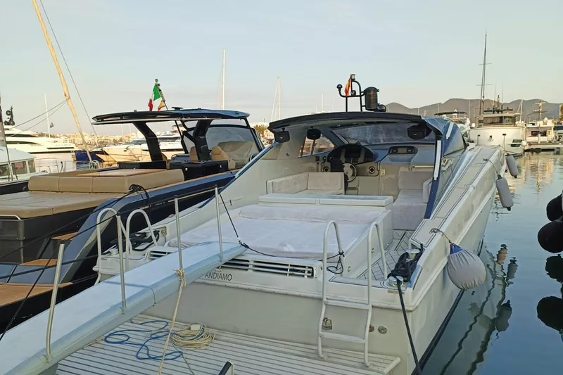  Yacht Photos Pics Luxury Otam 55 Millenium yacht docked in marina, 1998 model, elegant design.