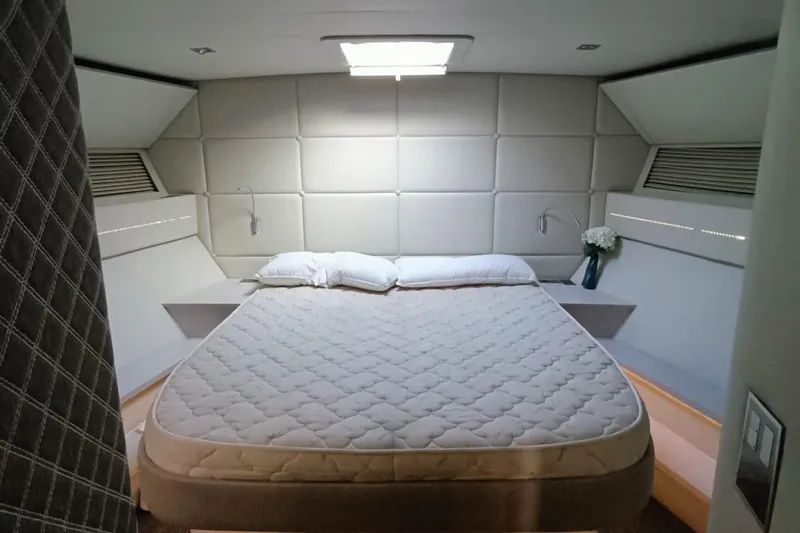  Yacht Photos Pics Luxurious bedroom interior of 1998 Otam 55 Millenium yacht with modern design.