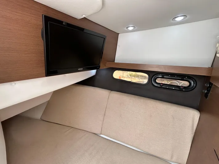  Yacht Photos Pics Interior cabin of 2017 Sea Ray SLX 350 Outboard with TV and seating.