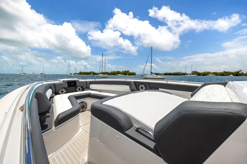  Yacht Photos Pics 2022 Cigarette 42 Auroris luxury boat interior with ocean view and blue sky.