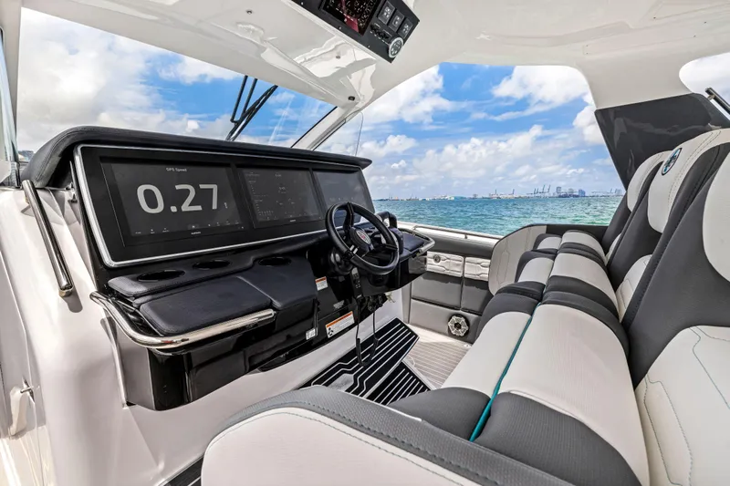  Yacht Photos Pics Interior of 2022 Cigarette 42 Auroris boat with modern dashboard and ocean view.