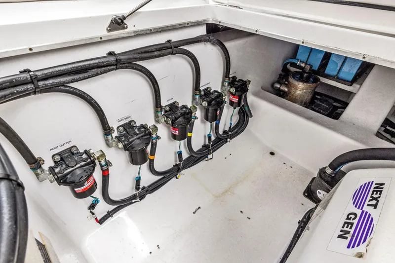  Yacht Photos Pics Engine compartment of 2022 Cigarette 42 Auroris boat, showcasing fuel system and wiring.