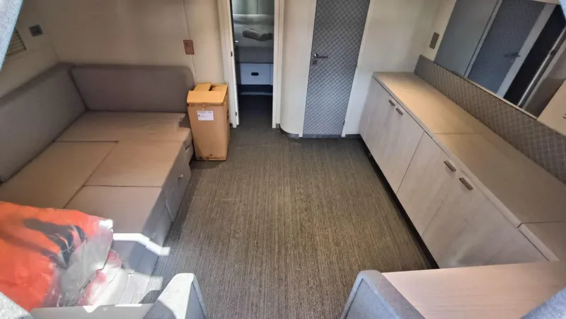  Yacht Photos Pics Interior of 1998 Otam 55 Millenium yacht with modern seating and cabinetry.