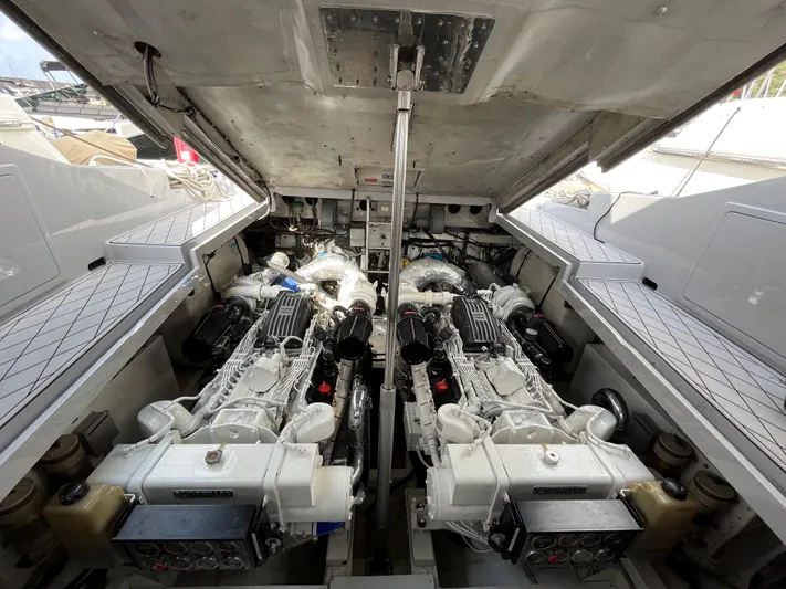  Yacht Photos Pics Engine room of a 1998 Otam 55 Millenium yacht, showcasing dual powerful engines.