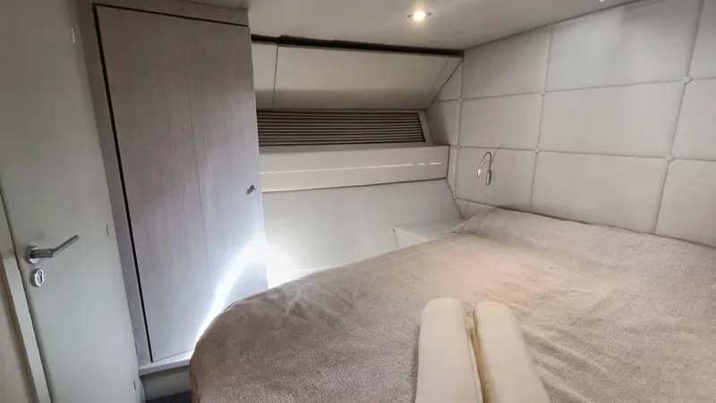  Yacht Photos Pics Interior cabin of 1998 Otam 55 Millenium yacht with modern design and cozy bedding.